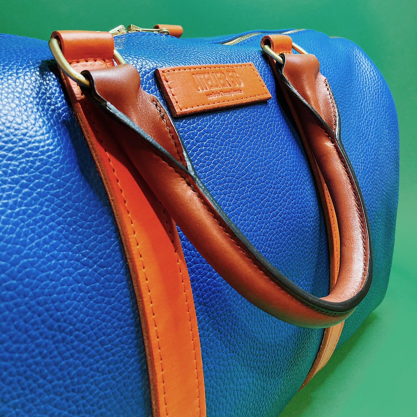 'Atelier 56' Barrel Bag in Orange & Blue